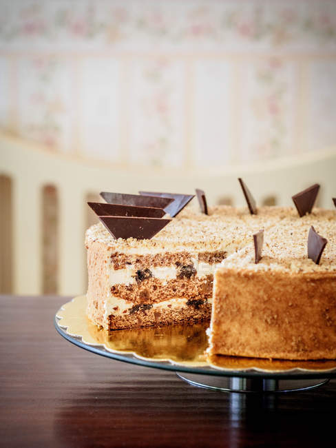 Closeup view of chocolate cake on a cake stand — Stock Photo