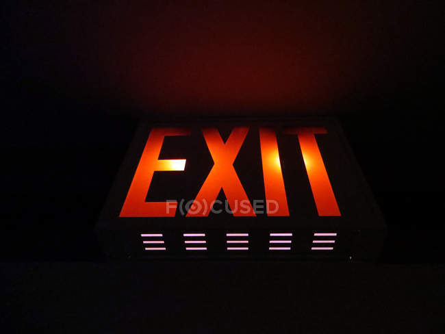Closeup view of Illuminated exit sign — Stock Photo