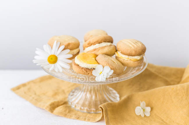 Lemon Melting Moments on a cake stand — Stock Photo