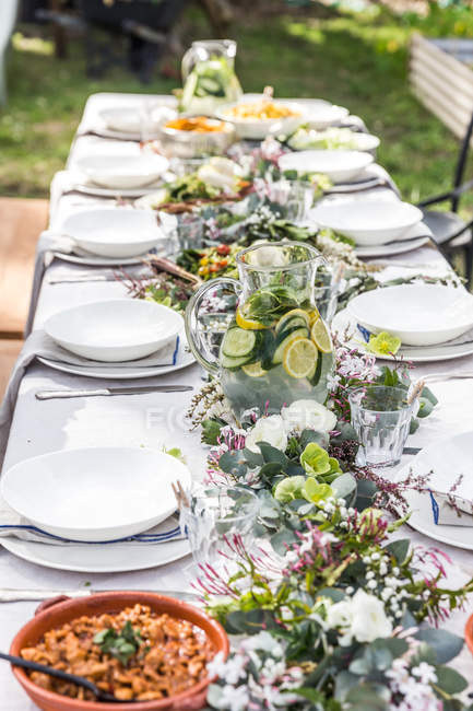 Closeup view of Table setting in a garden — Stock Photo