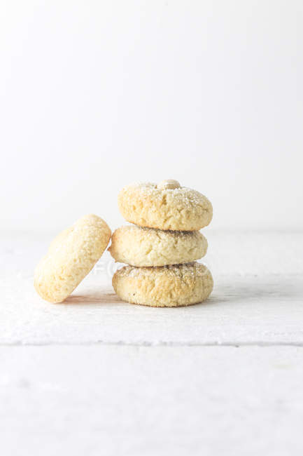 Stack of Almond macaroons over white background — Stock Photo