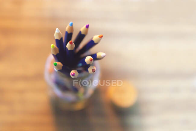 Colored pencils in a jar — Stock Photo
