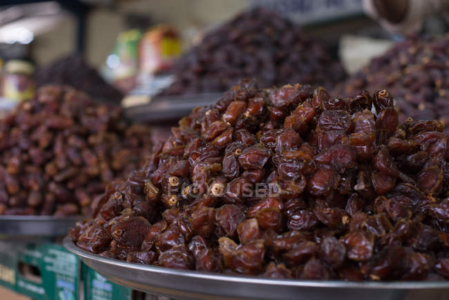 Closeup view of sweet dates over trays — Stock Photo