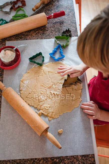 Boy making Christmas cookies — Stock Photo
