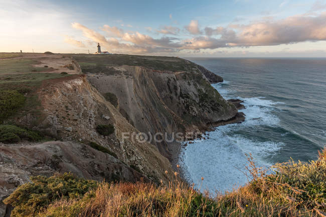 Scenic view of Lighthouse on cliff, Espichel Cape, Lisbon, Portugal — Stock Photo
