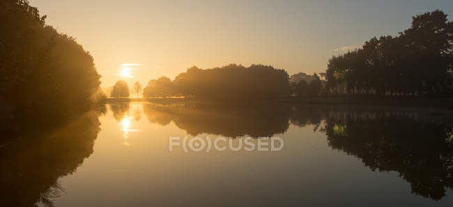 Morning sun over river landscape, Enschede, Twente, Holland — Stock Photo