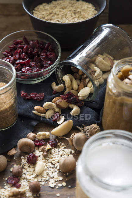 Nuts, oats, dried fruit and honey — Stock Photo