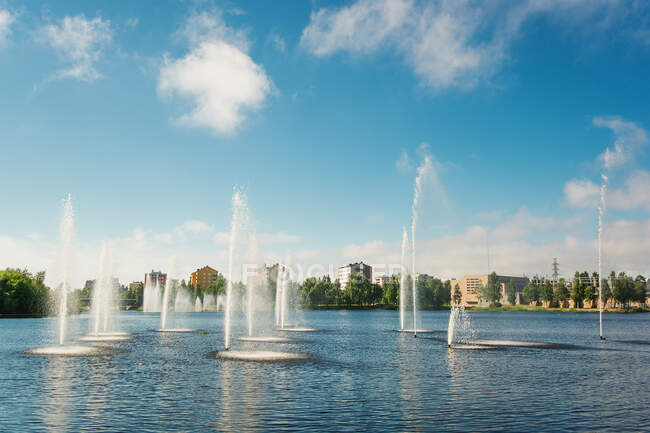 Water fountains in lake, Oulu, Finland — Stock Photo