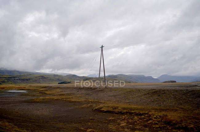 Linha de energia na paisagem rural, Islândia — Fotografia de Stock
