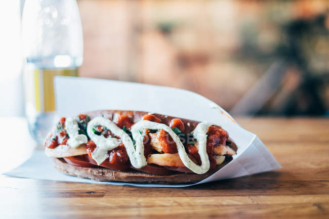 Closeup view of tasty vegan hot dog on a table — Stock Photo