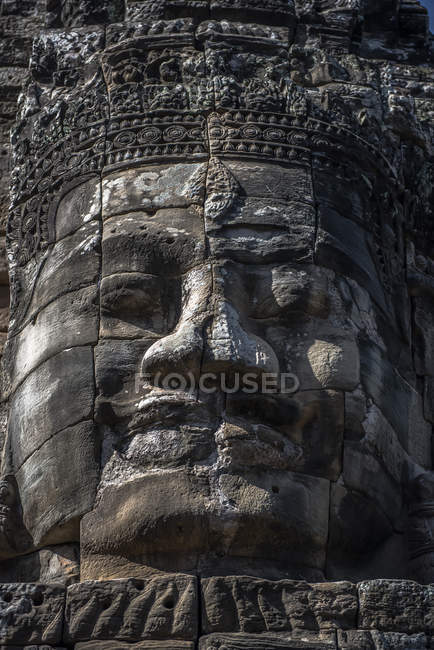 Rosto de pedra esculpida, Templo Bayon, Angkor Wat, Camboja — Fotografia de Stock