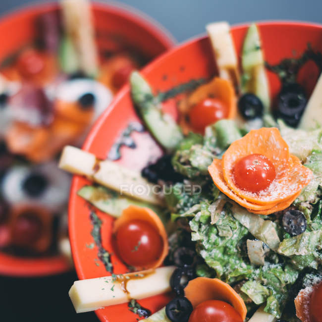 Salad with gouda cheese, olives, cucumber and tomatoes — Stock Photo