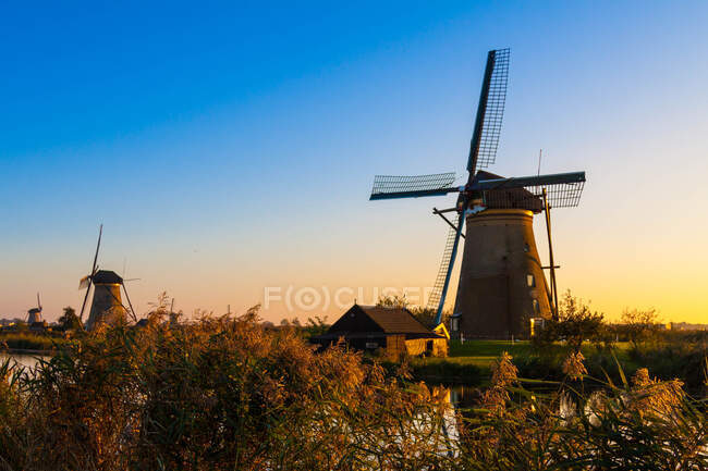Kinderdijk is a village in the Netherlands, belonging to the municipality of Molenwaard, in the province South Holland — Stock Photo