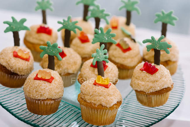 Funky beach themed cupcakes on a plate — Stock Photo