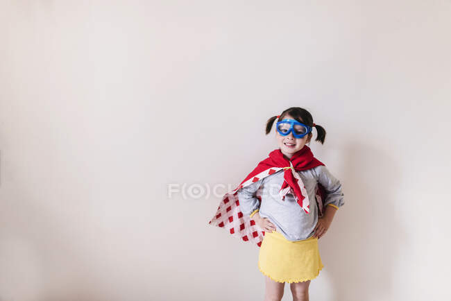 Portrait of a girl dressed as a superhero — Stock Photo