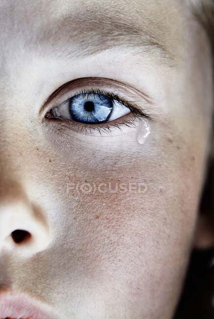 Cropped shot of Portrait of boy crying — Stock Photo