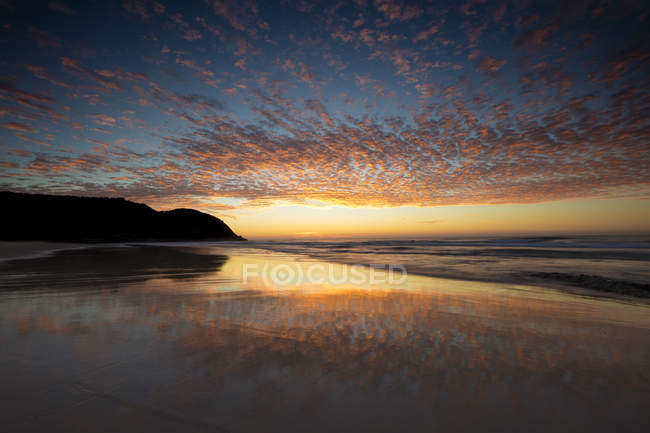 Vista panorâmica da praia ao pôr do sol, Crescent Head, New South Wales, Austrália — Fotografia de Stock