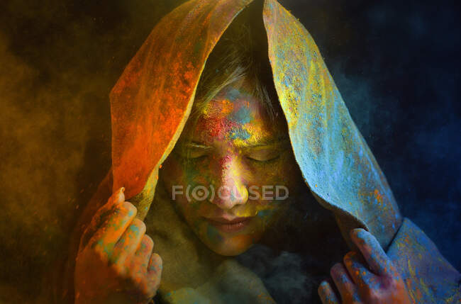 Portrait of a woman covered in powder paint — Stock Photo