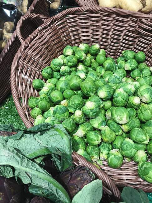 Basket of brussels sprouts, closeup view — Stock Photo