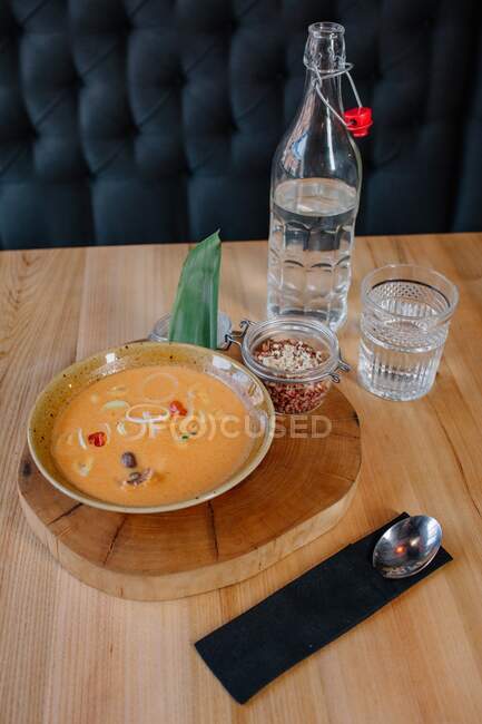 Spicy Asian soup with water — Stock Photo