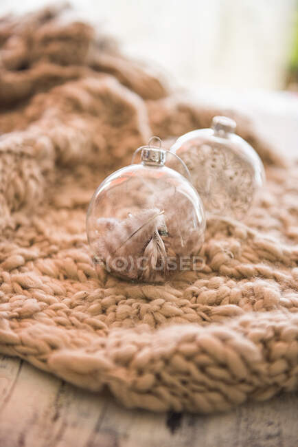 Christmas glass baubles decorations wool plaid — Stock Photo