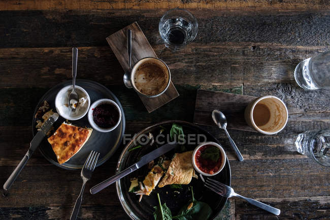 Omelet, cottage cheese casserole with blueberries and coffee breakfast — Stock Photo