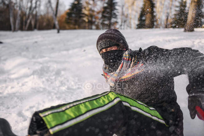 Man falling off a sledge — Stock Photo