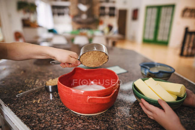 Two boys baking cookies at domestic kitchen — Stock Photo