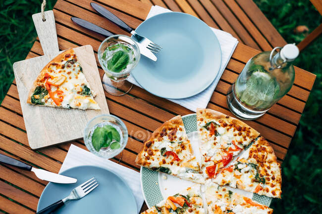 Gluten Free Pizza with mint infused water — Stock Photo