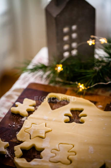 Close-up view of cookie dough on a chopping board — Stock Photo