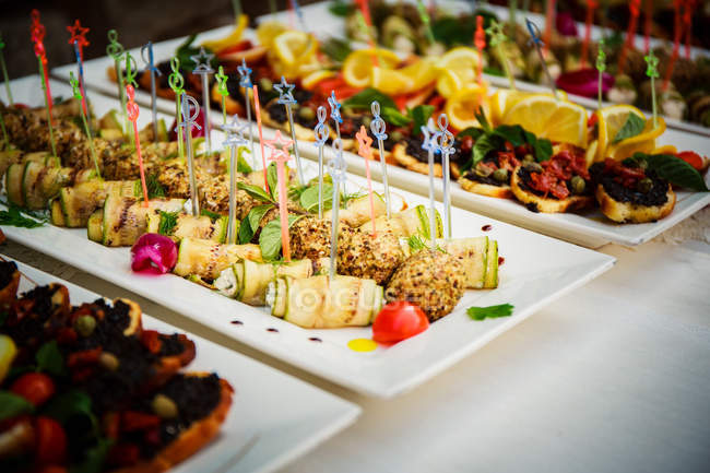 Canapes on a serving plates, closeup view — Stock Photo