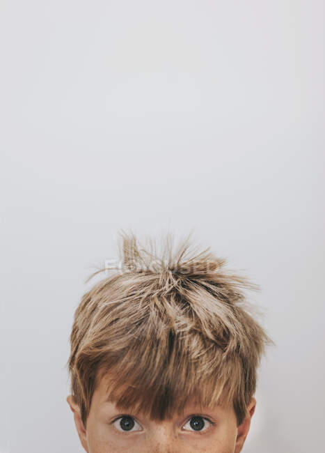 Portrait of a boy with freckles and bed hair — Blonde Hair, indoors - Stock  Photo | #238186536