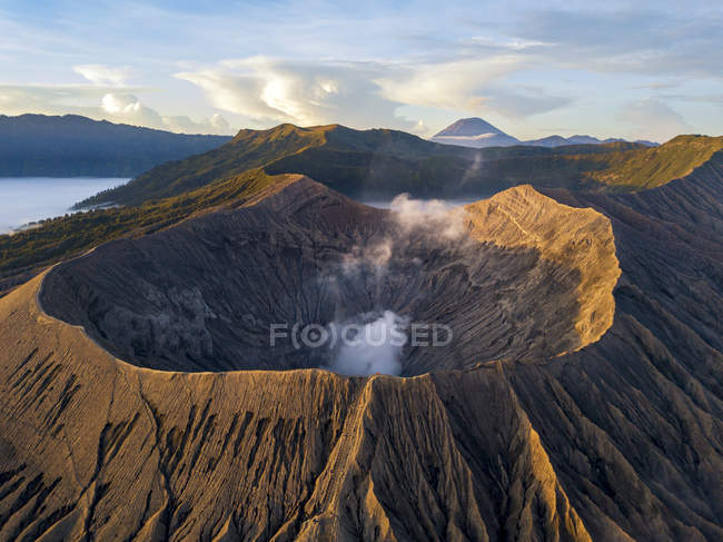 Sunrise at Bromo Tengger Semeru National Park in East Java, Indonesia taken with the dji Mavic Pro Platinum. Low clouds visible around Mount Bromo crater. — Stock Photo