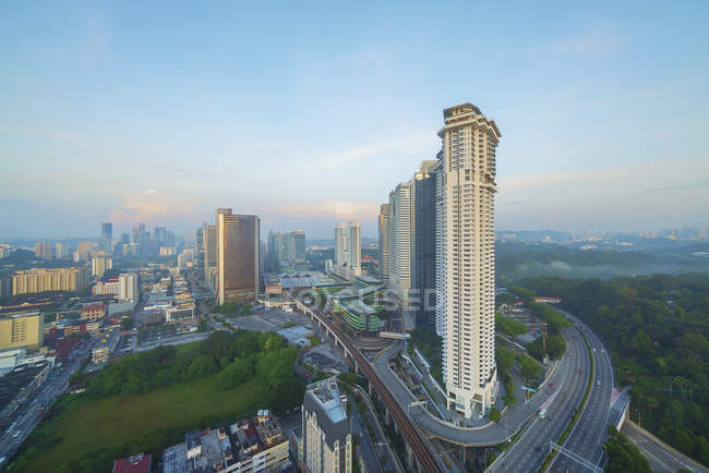City skyline at sunrise, Kuala Lumpur, Malaysia — Stock Photo