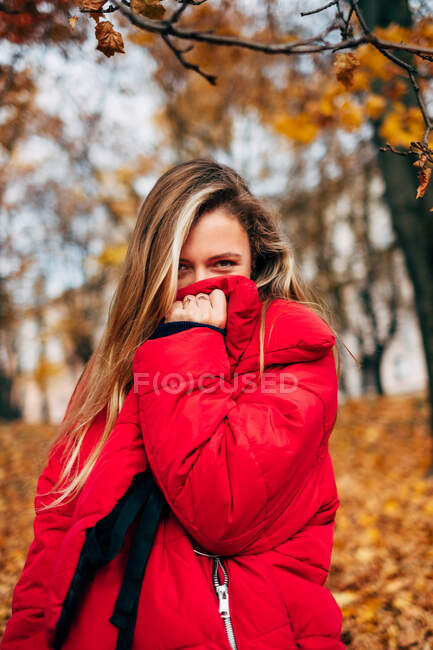 Woman hiding her face behind her coat, Belarus — Stock Photo