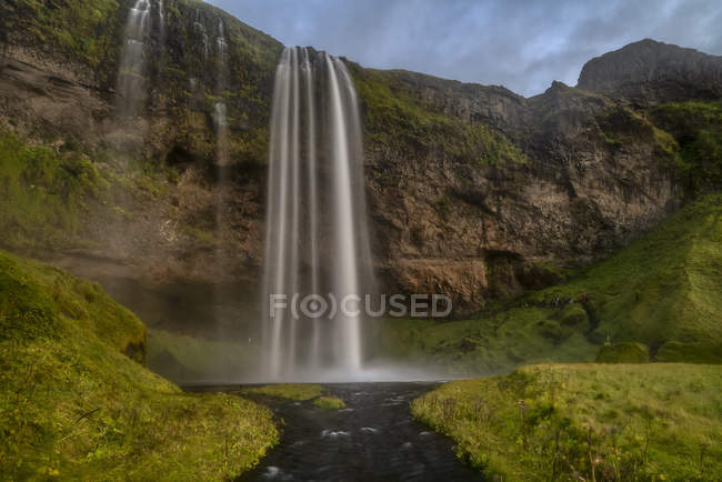 Scenic view of Seljalandsfoss at sunset, South Iceland — Stock Photo