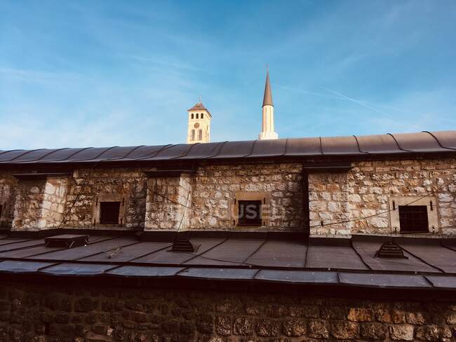 Old church stone building with towers under blue sky — Stock Photo