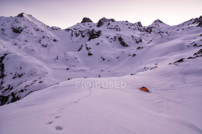 Footprints leading to a tent in Pyrenees Mountains, Marcadau, France — Stock Photo