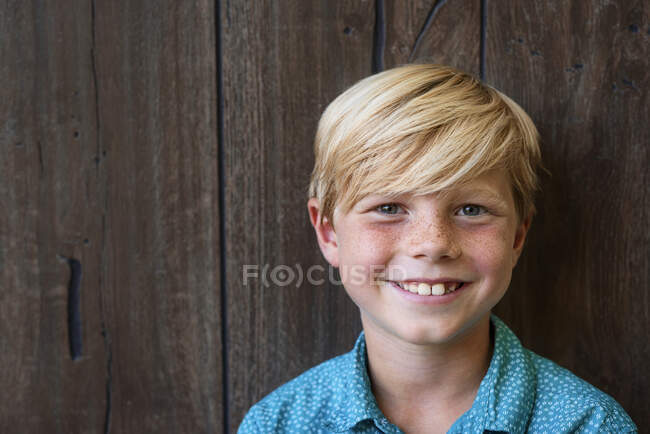 Portrait of a smiling boy with freckles — Stock Photo