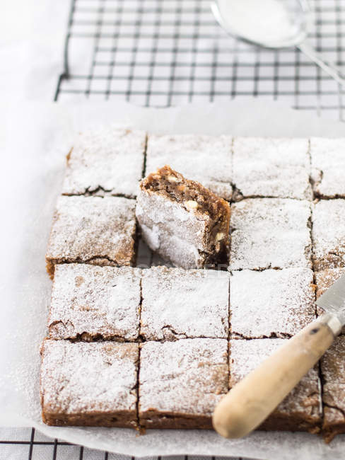 White chocolate caramel blondies on a cooling rack — Stock Photo