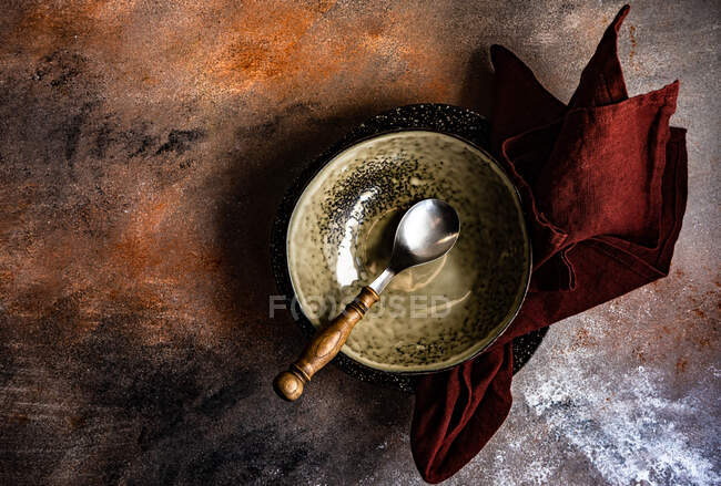 Vintage table setting with cutlery, knife, fork and spoon on a dark background. — Stock Photo
