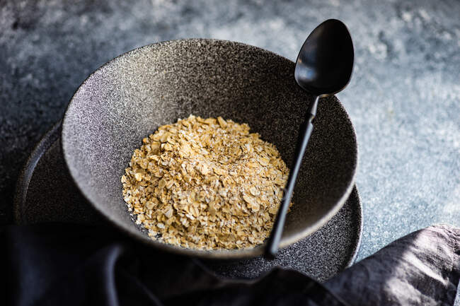 Breakfast bowl filled with oats — Stock Photo