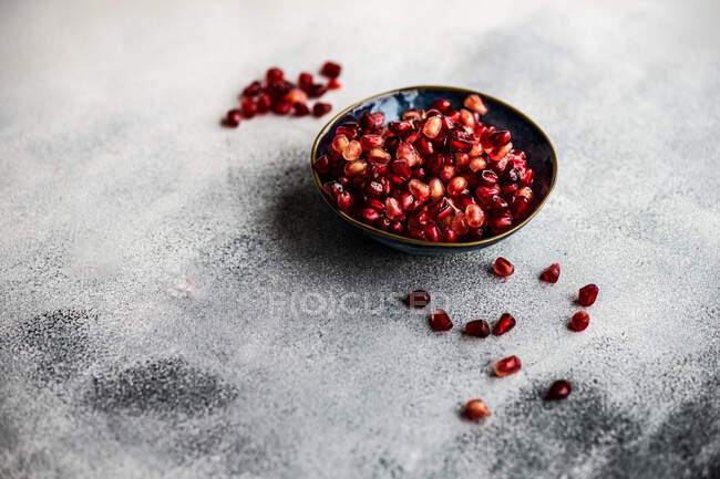 Red and black pepper on a dark background. — Stock Photo
