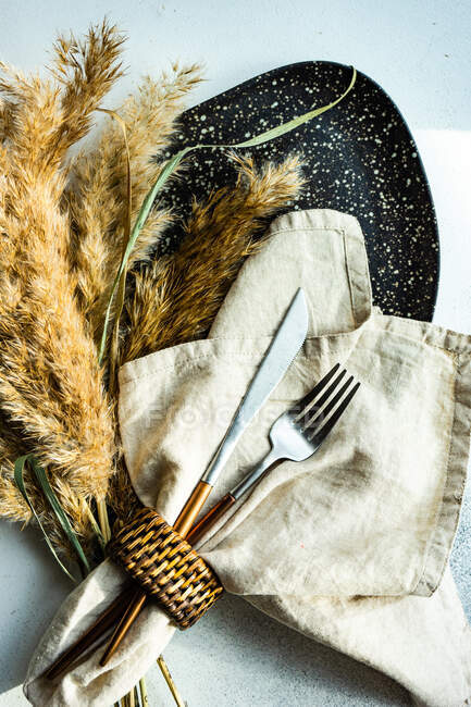 Table setting with cutlery and knife on a white background — Stock Photo