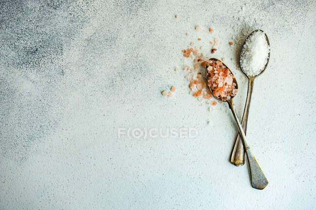 Top view of flour and salt on wooden background — Stock Photo