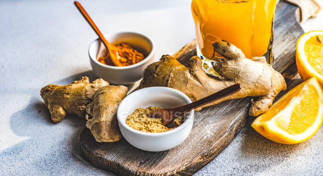 Ginger root with honey and turmeric. selective focus. — Stock Photo