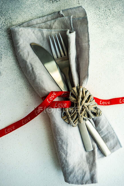 Place setting on a table for Valentine's Day — Stock Photo