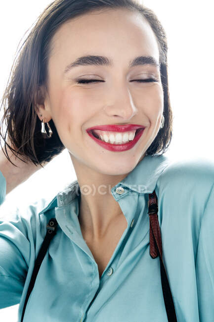Portrait of a young woman with a beautiful smile — Stock Photo