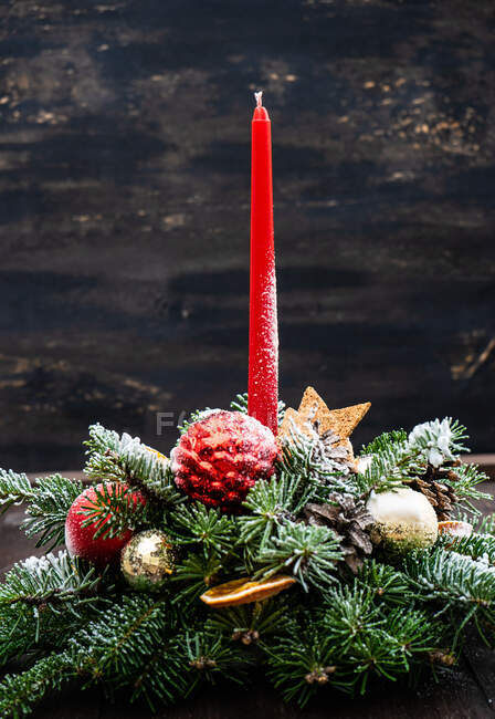 Christmas candle decoration on a table — Stock Photo