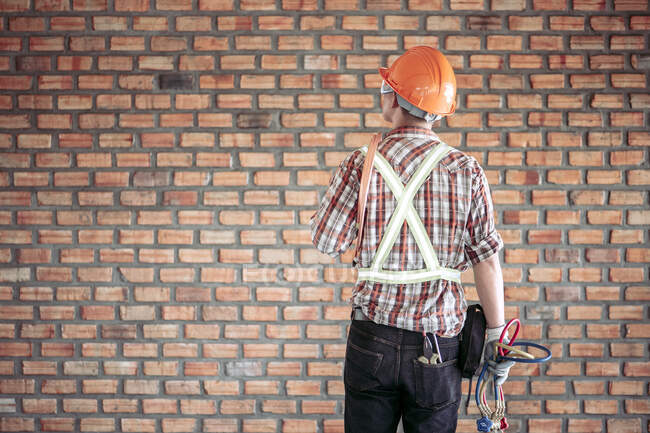 Rear view of an engineer on a construction site, Thailand — Stock Photo